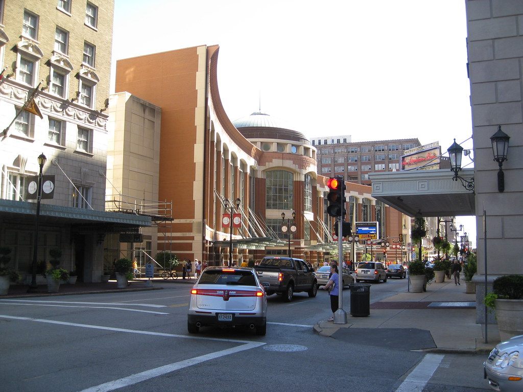 The red-brick Washington Avenue entrance of America's Center in downtown St. Louis, with its domed rotunda and curved facade above the street