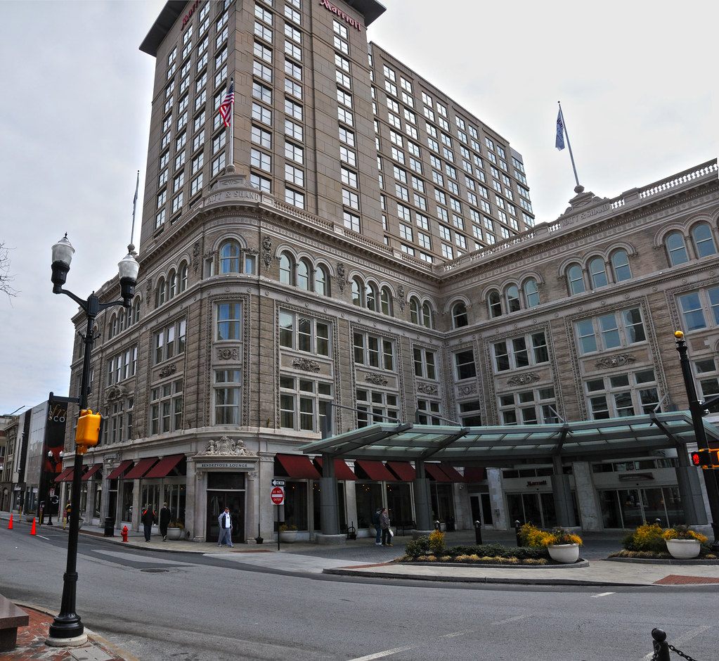 The Lancaster Marriott at Penn Square tower rising behind the preserved Beaux Arts facade of the Watt & Shand department store