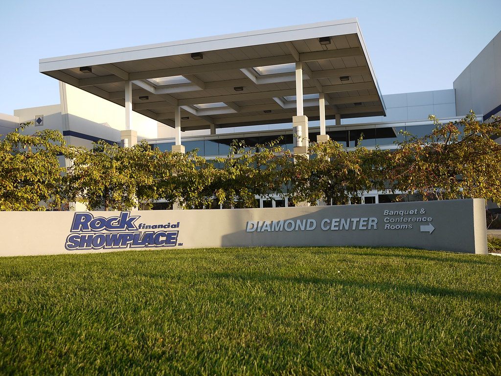 The canopied Diamond Center entrance of the showplace in Novi, with its Rock Financial Showplace sign on the lawn, in 2010
