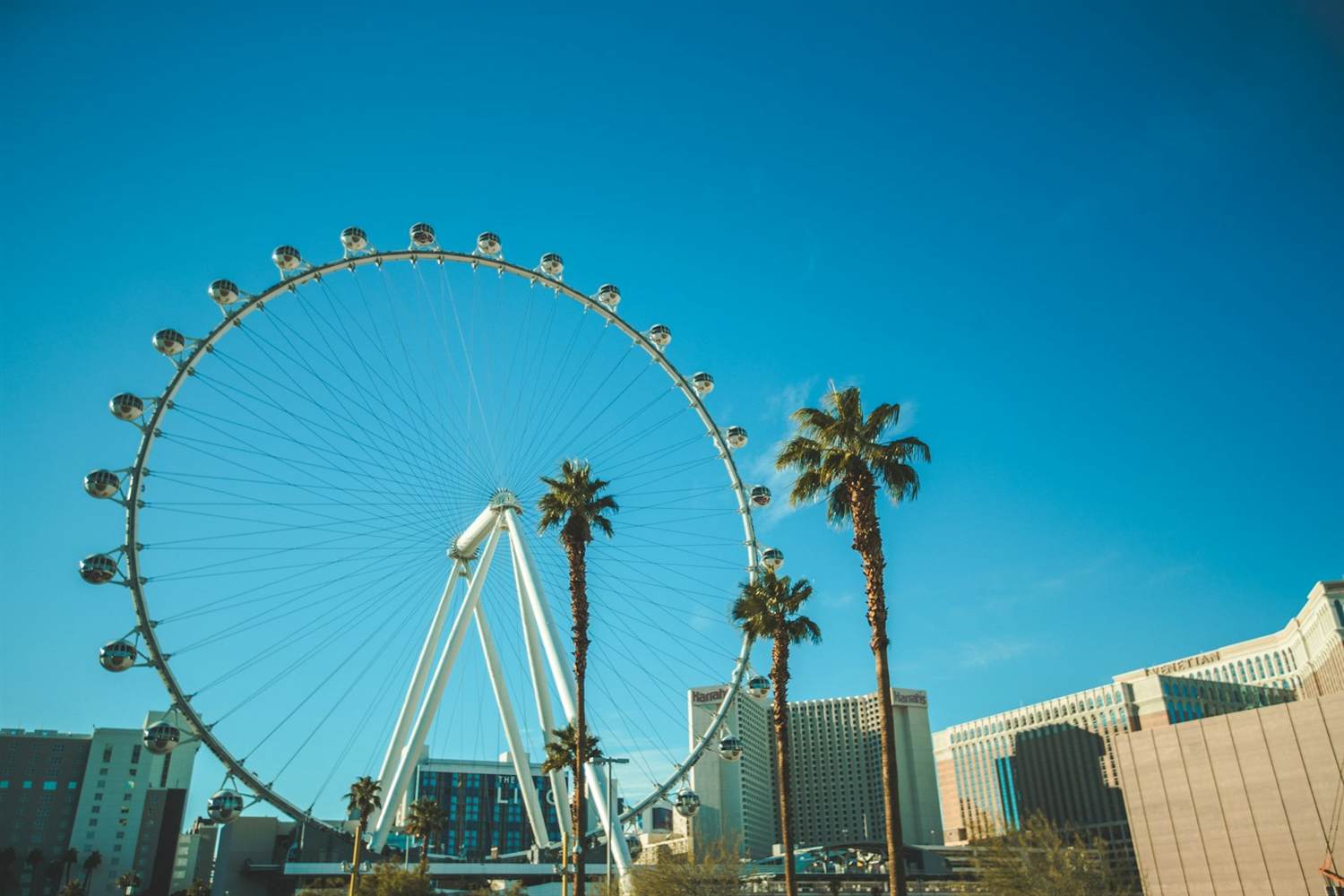 The High Roller observation wheel with the Venetian tower behind it
