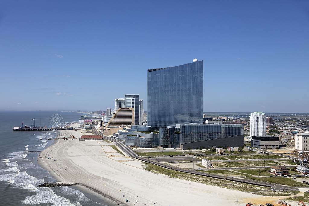 Aerial view of Atlantic City's boardwalk, beach and casino towers