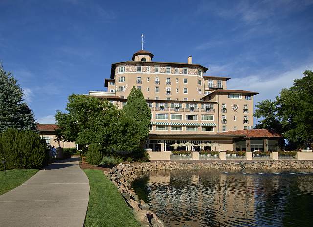 The Broadmoor Hotel's Italian Renaissance-style main building, with a lake in the foreground
