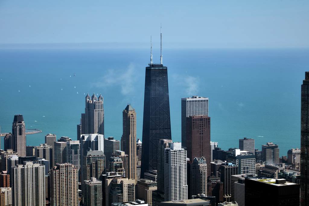 Aerial view of the Chicago skyline with Lake Michigan and the Hancock Tower