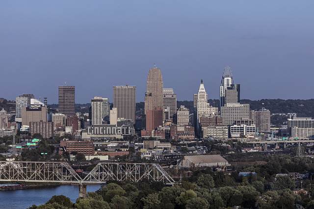 Dusk view of the Cincinnati, Ohio skyline with the illuminated CINCINNATI sign on the Duke Energy Convention Center