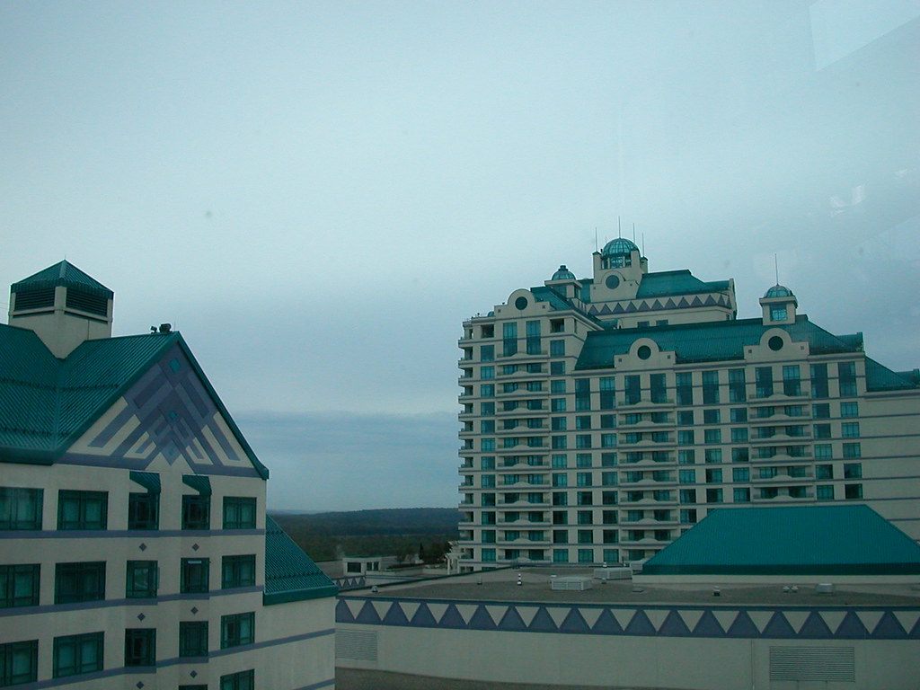 The cream-and-teal Grand Pequot Tower hotel with its green domed roofs, seen from a neighboring Foxwoods building