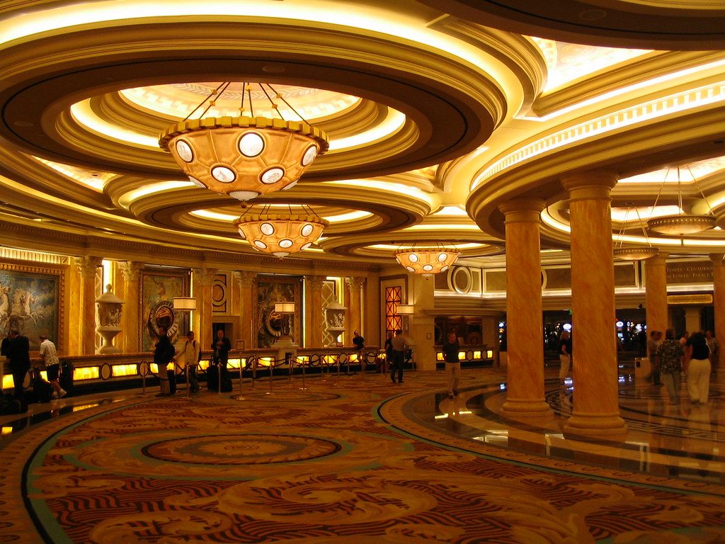 The Caesars Palace registration area with domed ceilings, hanging lamps and marble columns