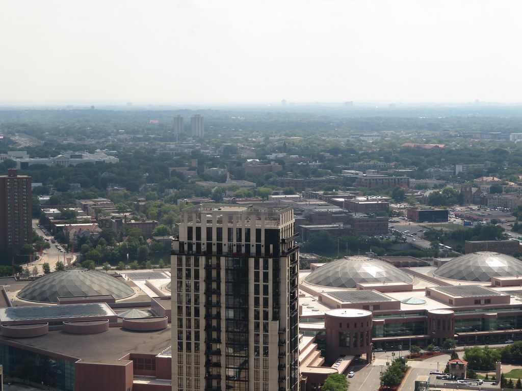 Three ribbed domes on the roof of the Minneapolis Convention Center seen from a downtown high-rise