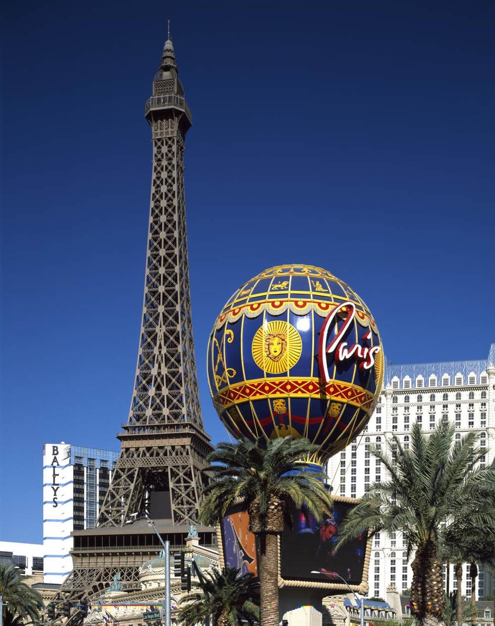 The Paris Las Vegas Eiffel Tower and balloon against a blue sky