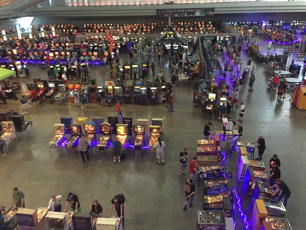 Rows of arcade and pinball machines spread across a David L. Lawrence Convention Center exhibit hall during the ReplayFX festival