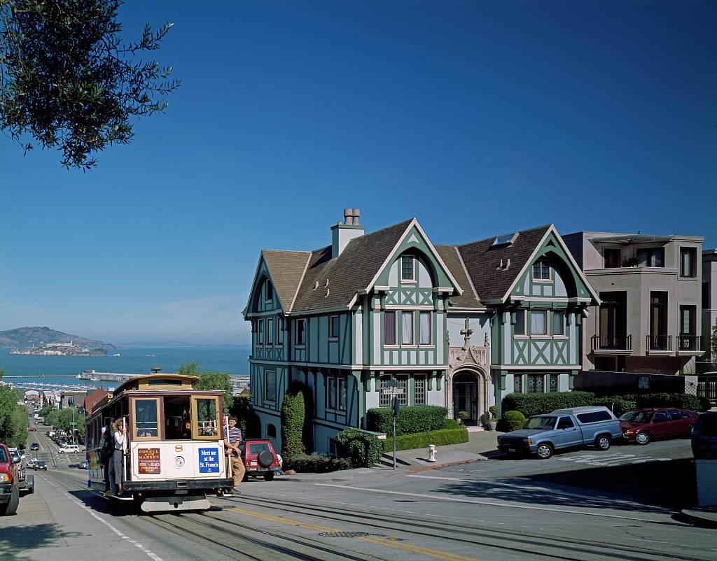 A San Francisco cable car on a city street
