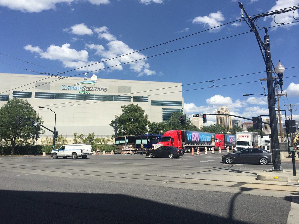 Tour trucks lined up outside the downtown Salt Lake City arena now called the Delta Center, the neighbor at the heart of the new district