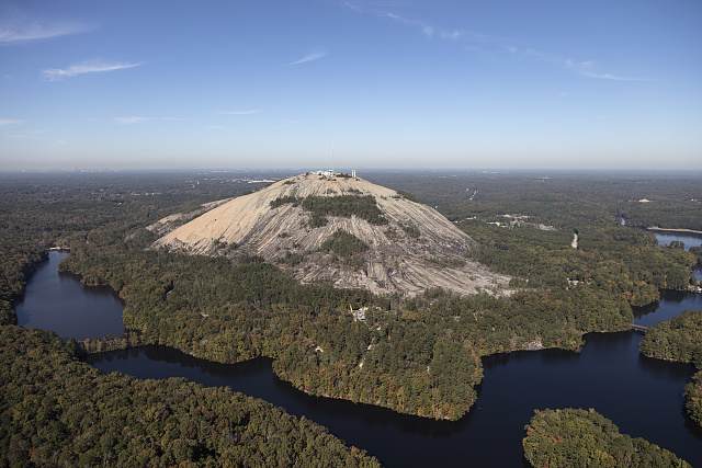 Aerial view of Stone Mountain, Georgia surrounded by lakes and forest