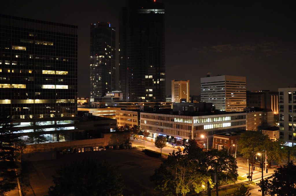 Office towers and lit buildings of downtown White Plains at night