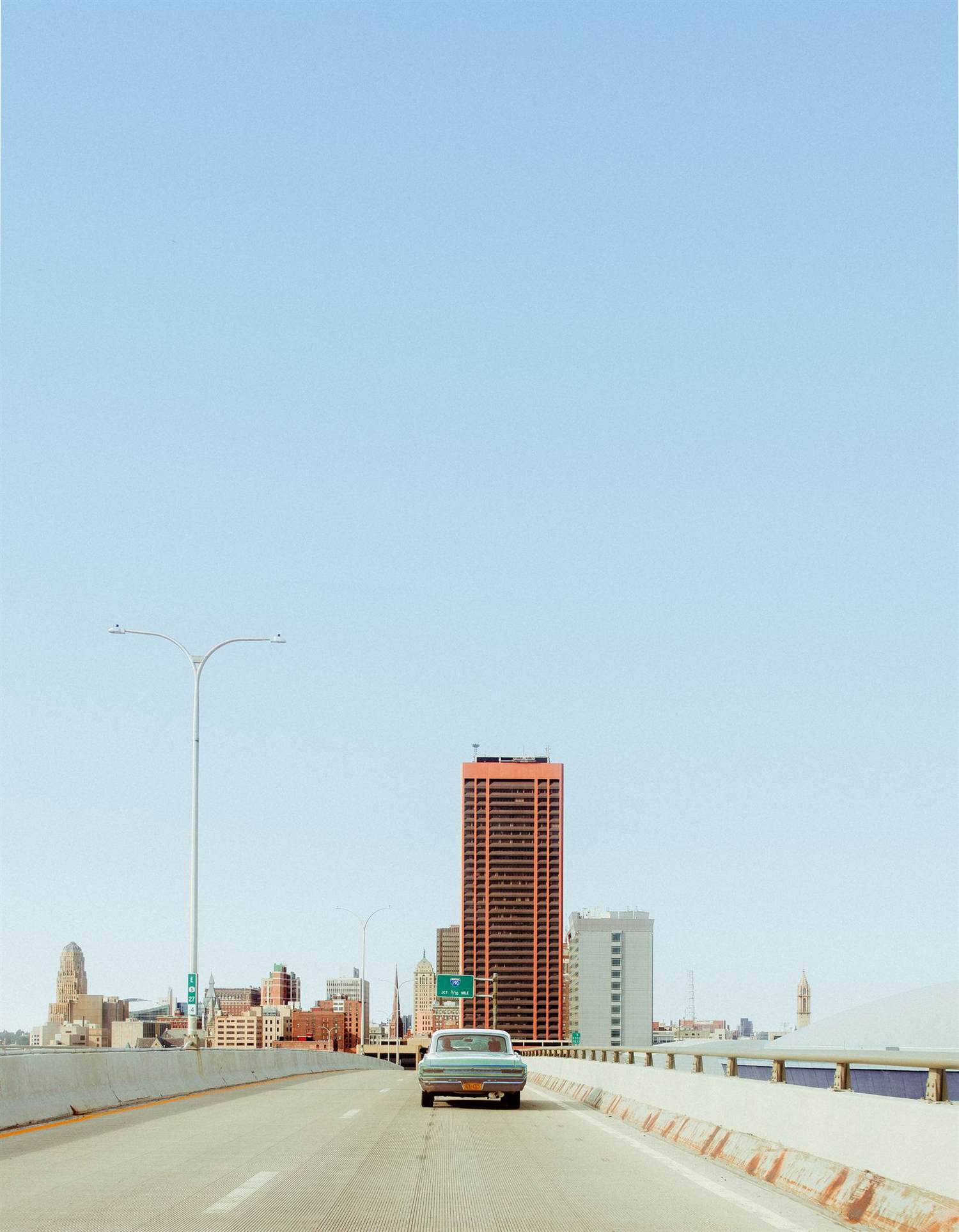 The downtown Buffalo skyline under a clear blue sky