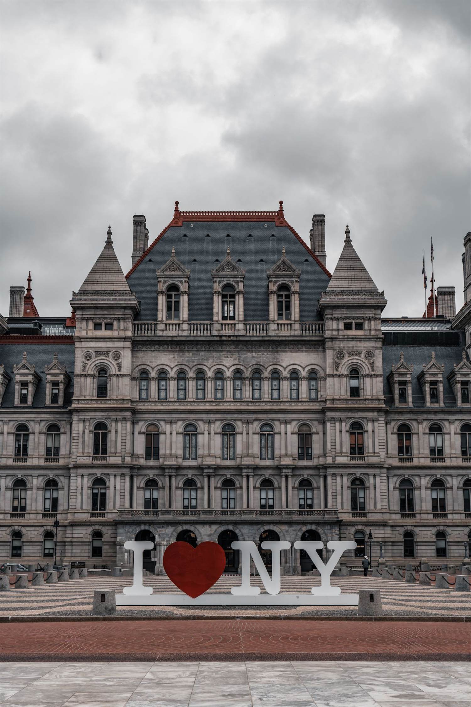 The New York State Capitol in Albany with the I Love NY sign in front