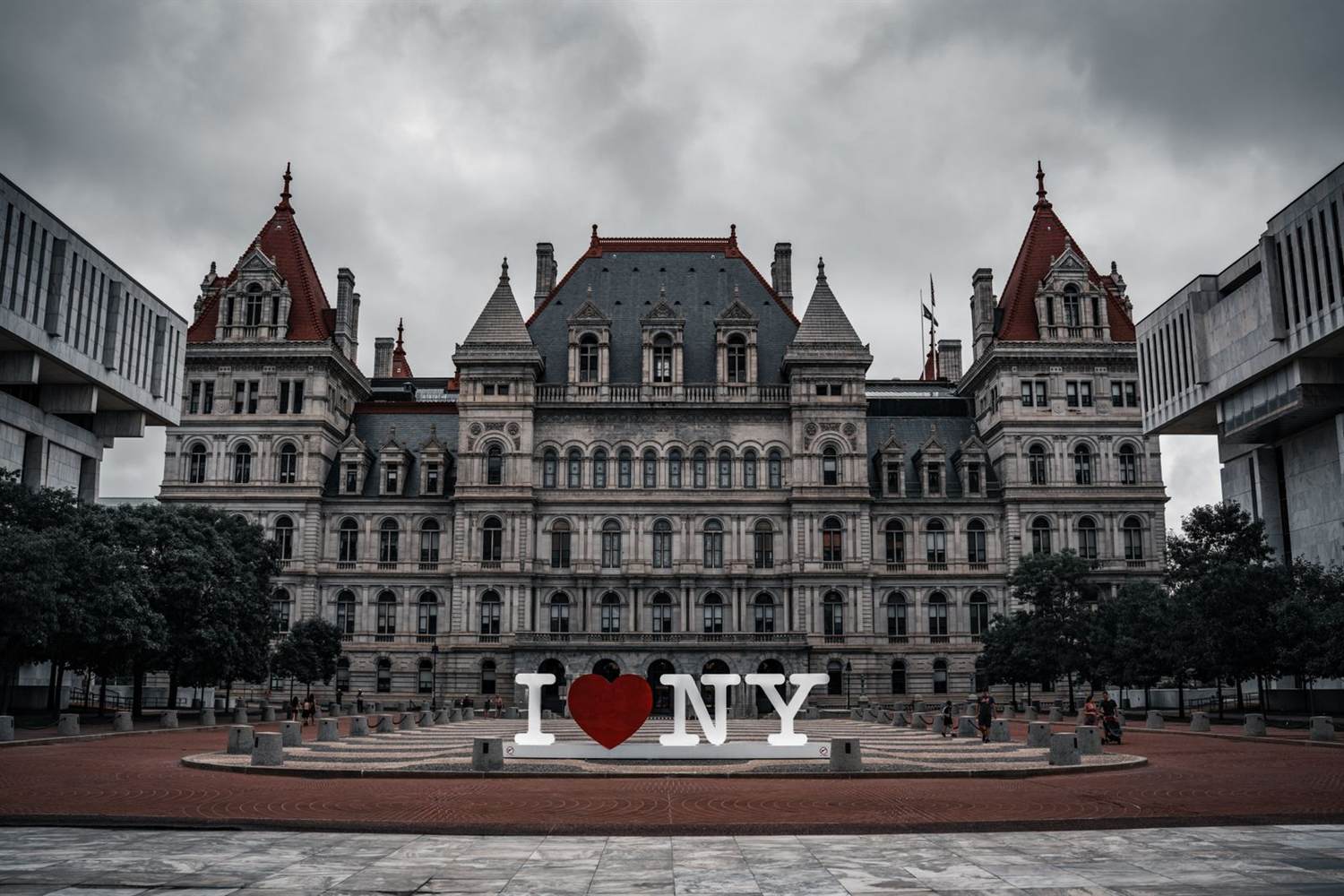 The New York State Capitol with an I Love NY sign in front