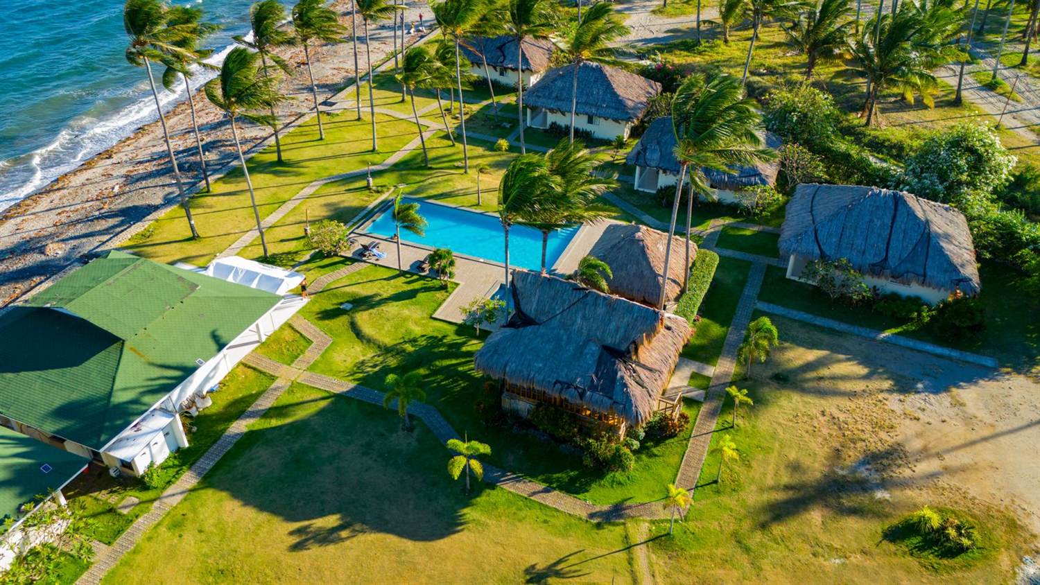 A resort hotel with pools and landscaped grounds