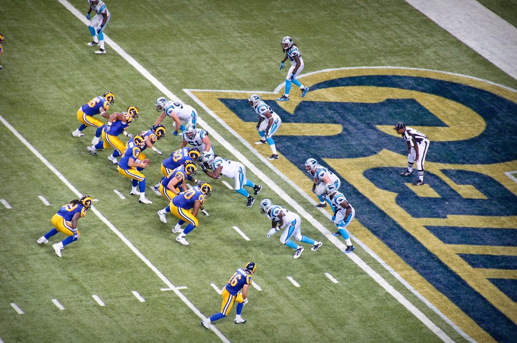 Rams and Panthers lined up at scrimmage on the turf of the Edward Jones Dome, now the Dome at America's Center, in St. Louis