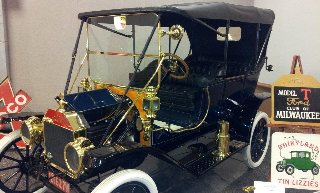 A brass-trimmed Ford Model T touring car on the Model T Ford Club of Milwaukee stand at the Greater Milwaukee Auto Show