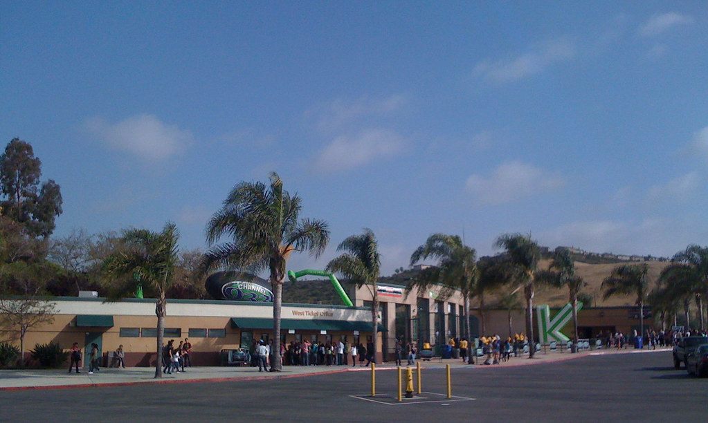 Concertgoers gathering outside the palm-lined ticket office of the amphitheater in Chula Vista