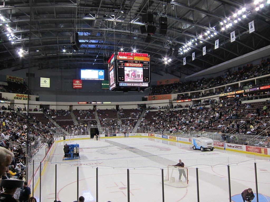 A near-full Giant Center arena in Hershey at intermission, with the ice being resurfaced under the center scoreboard