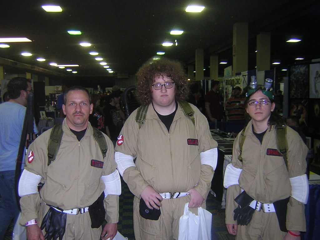 Three fans in Ghostbusters jumpsuits and proton packs on the show floor at the 2008 Pittsburgh Comicon