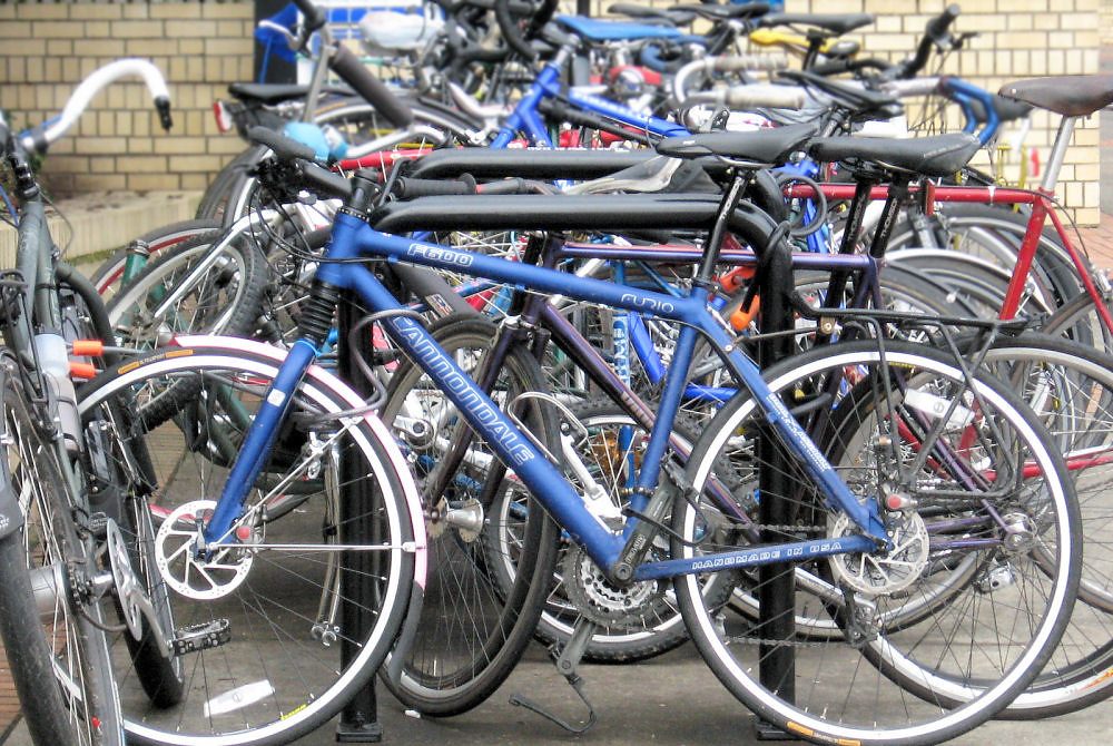 Dozens of bicycles locked together at a crowded bike rack at the Oregon Convention Center during the 2008 North American Handmade Bicycle Show