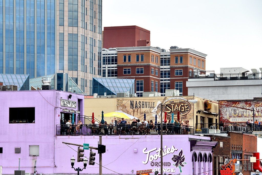 Crowds on the rooftop decks above Tootsie's Orchid Lounge and The Stage on Lower Broadway