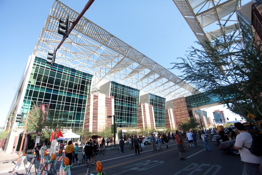 Crowds fill the street outside the Phoenix Convention Center's glass halls and steel canopy during Phoenix Comicon 2015