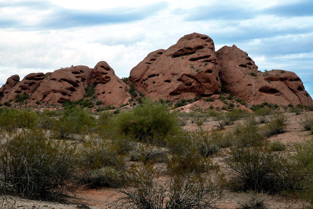 The red sandstone buttes of Papago Park rising above desert scrub in Phoenix