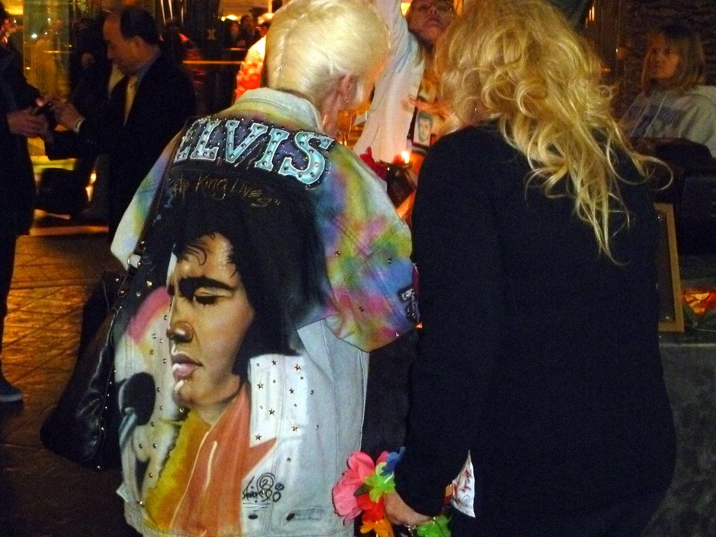Elvis fans, one in a hand-painted Elvis jacket, at the Elvis birthday candle lighting at the Las Vegas Hilton during CES 2011