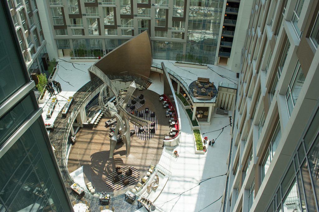 Looking down into the curving main lobby and atrium of the Marriott Marquis Washington DC from an upper corner