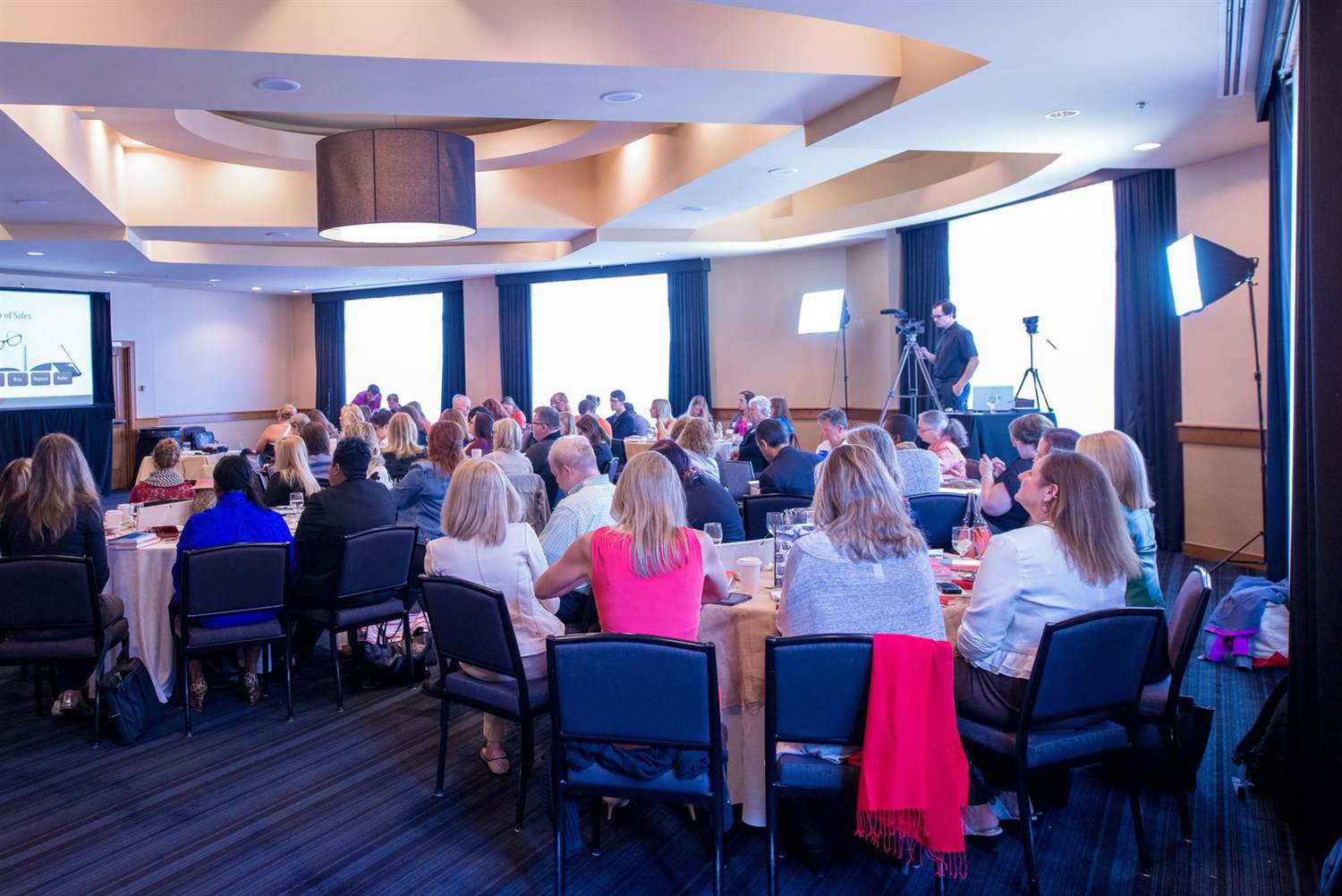 Colleagues around a table at a business conference