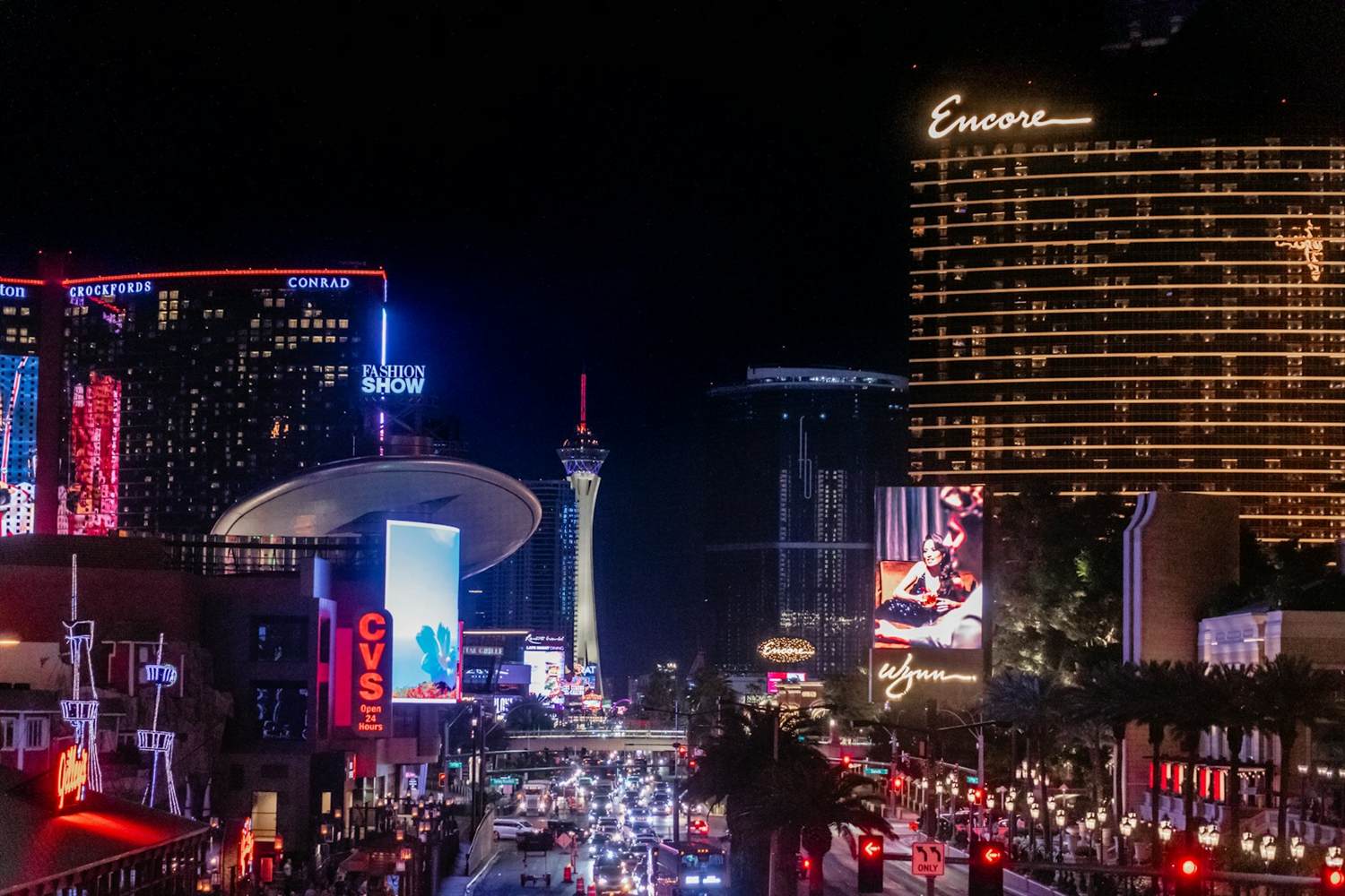 Night view up Las Vegas Boulevard toward Encore, Resorts World and the Strat from the Venetian's corner
