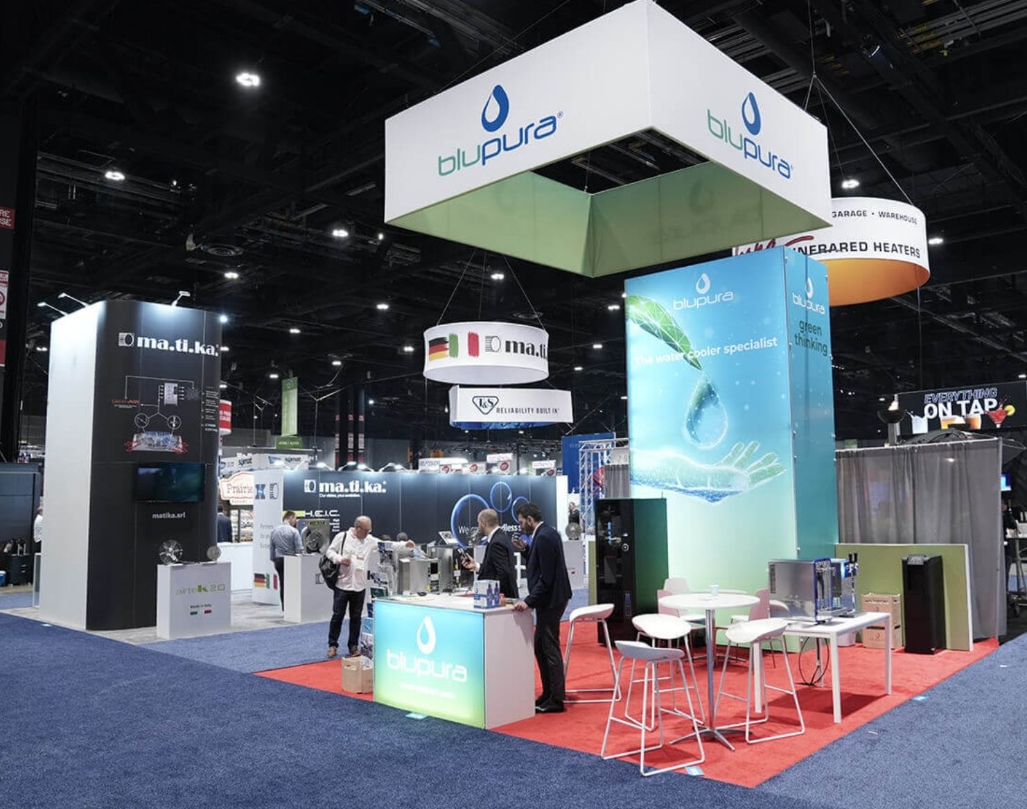 Design render of a 20×20 corner trade show booth: corner booth with square hanging sign and tall backlit tower