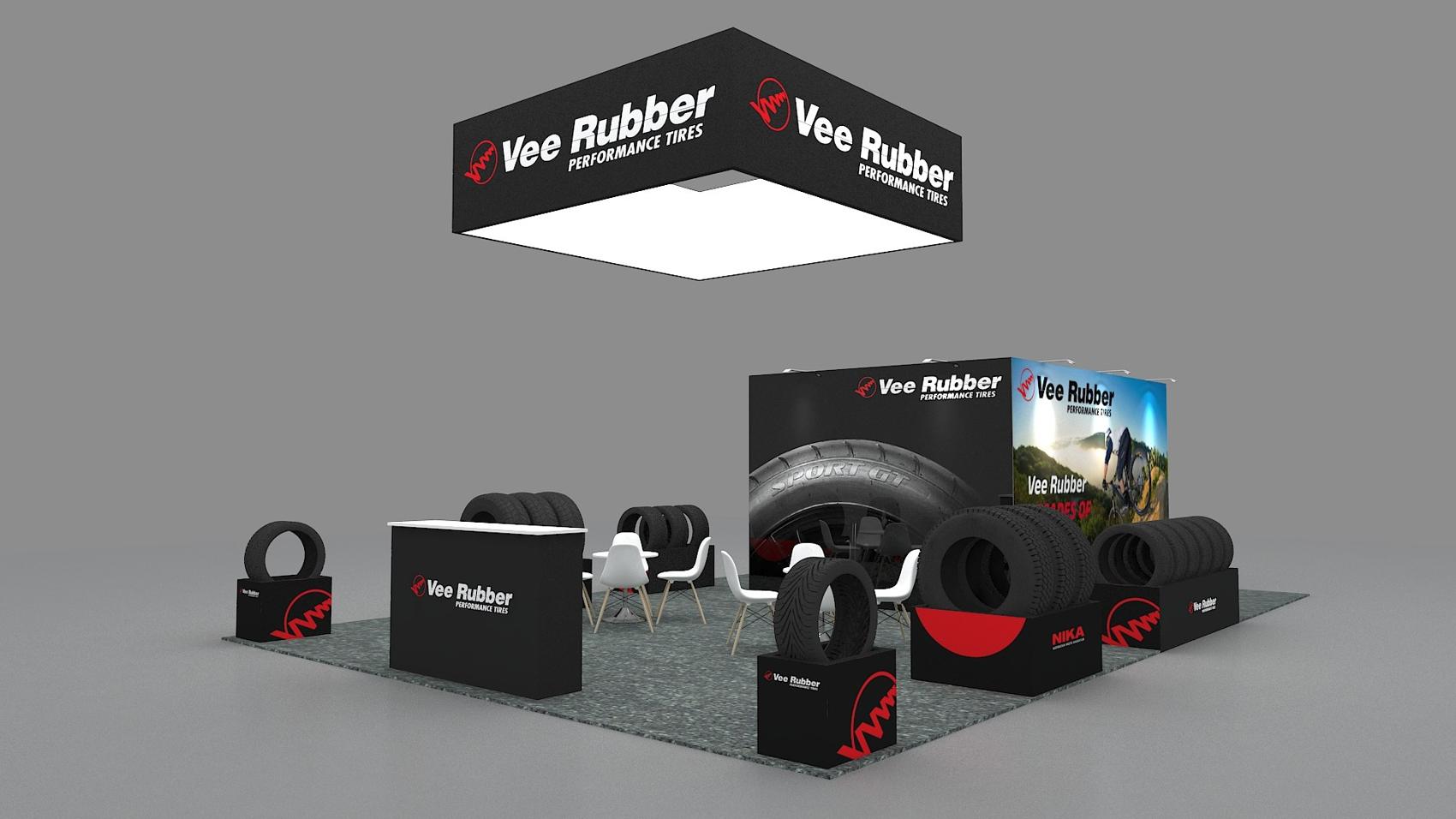 20×30 Island Booth With Square Hanging Sign and Tire Displays