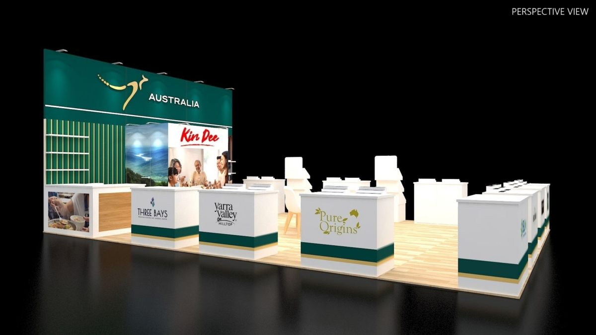 Design render of a 20×30 peninsula trade show booth: peninsula pavilion with product counters and green feature wall