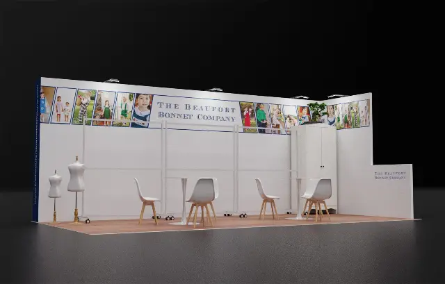 10×20 Corner Booth With Garment Racks and Photo Strip Graphics