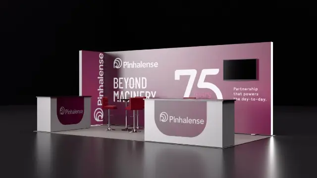 10×20 Corner Booth With Lit Graphic Wall and Two Counters