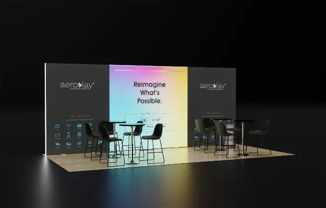 10×20 Inline Booth With Backlit Gradient Center Panel and Bar-Table Seating