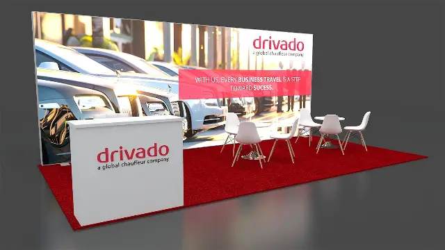 10×20 Inline Booth With Backlit Wall and Two Meeting Tables