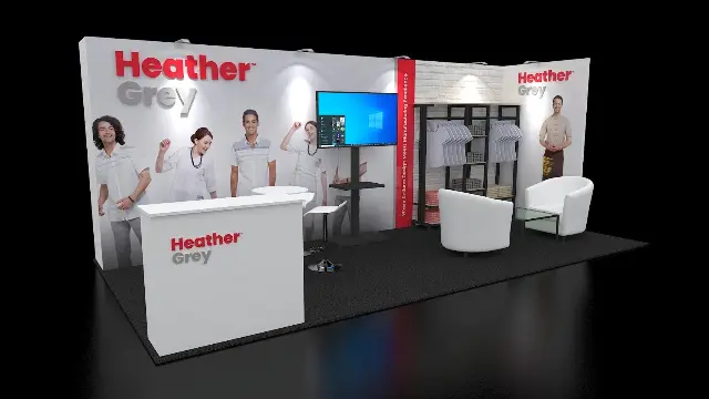 10×20 Inline Booth With Garment Display and Lounge Chairs