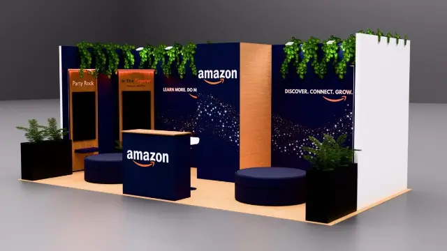 10×20 Inline Booth With Hanging Greenery and Lit Screen Towers