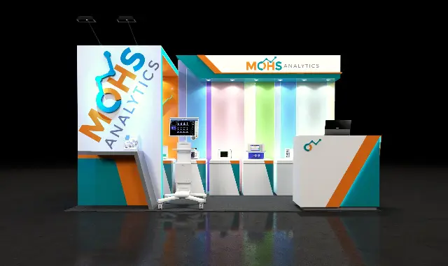10×20 Inline Booth With Light-Panel Back Wall and Orange Display Alcove