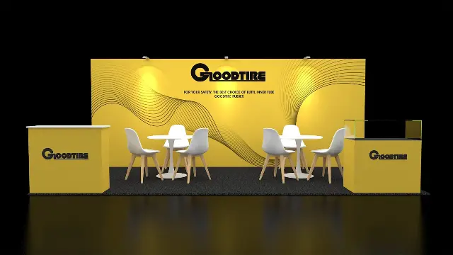 10×20 Inline Booth With Yellow Wave Backdrop and Two Meeting Tables