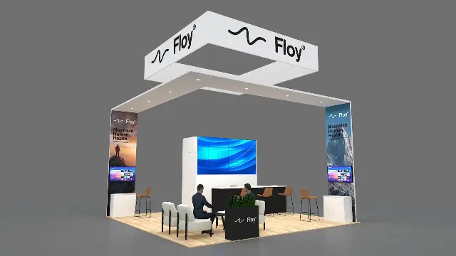 20×20 Island Booth With Square Hanging Sign and Video Wall