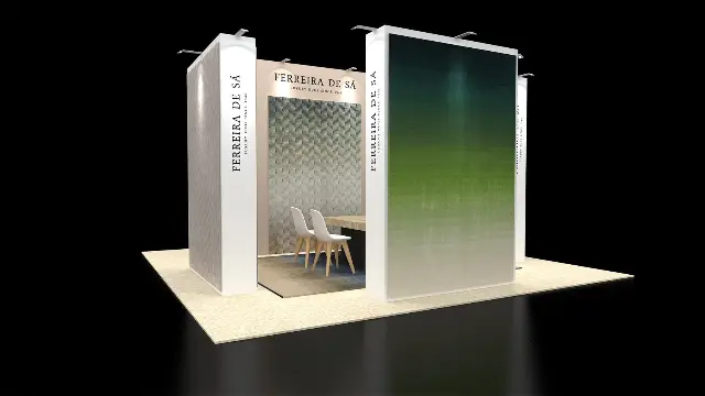 20×20 Island Booth With Tall Display Towers and Central Meeting Nook