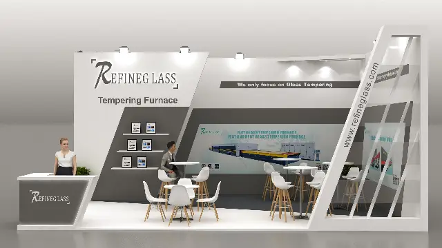 20×30 Inline Booth With Slanted Gray Panels and Angled Reception Counter