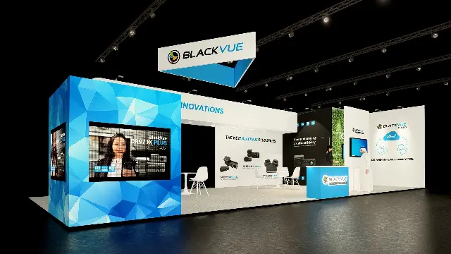 20×40 Corner Booth With LED Video Cube and Green Wall