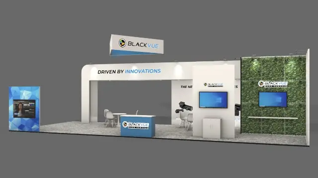 20×50 Peninsula Booth With Overhead Header Frame and Green Wall